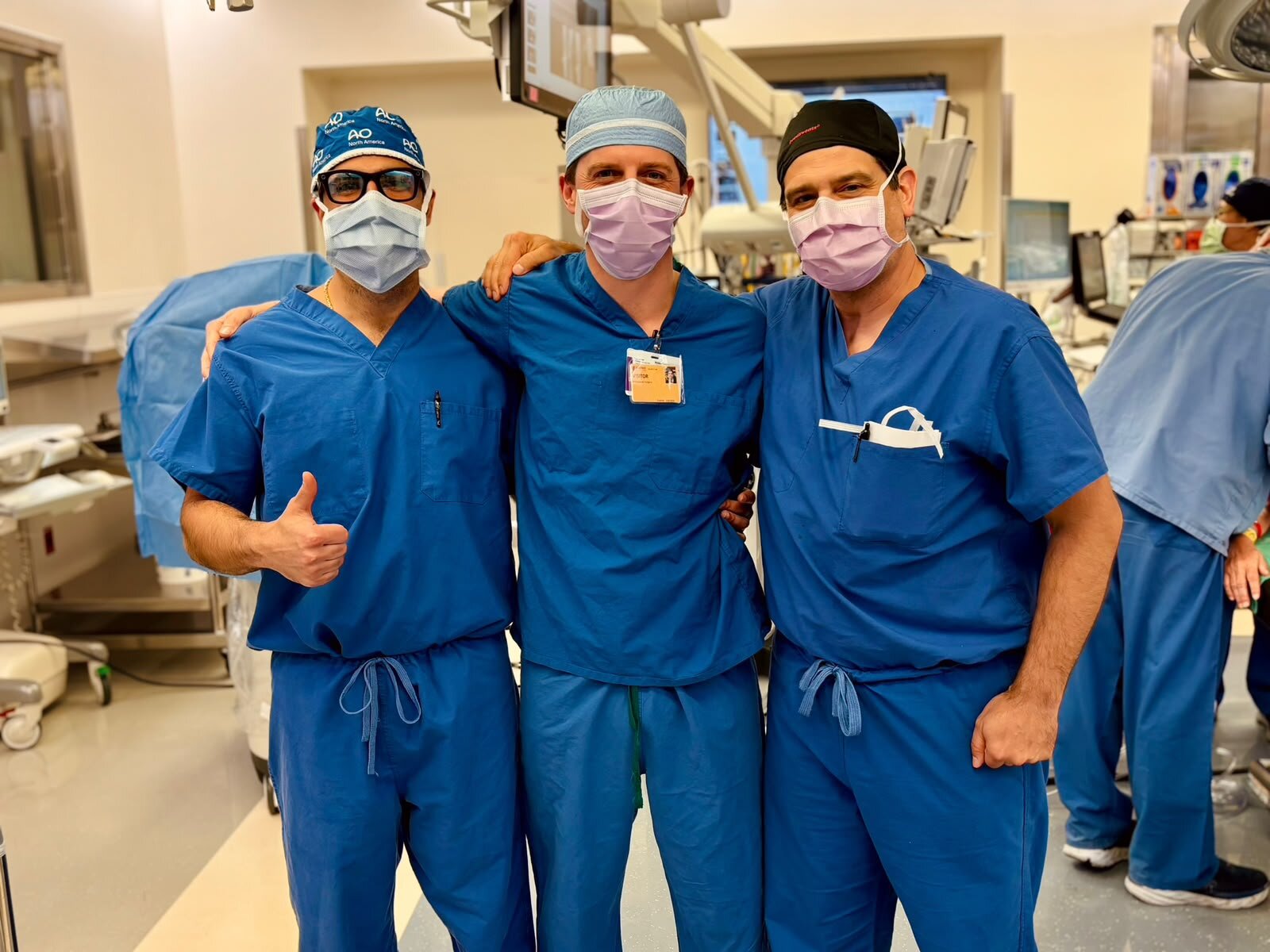 Dr. Matar with two fellow surgeons in the operating room
